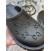 Gucci slip-on sandal Black perforated GG rubber